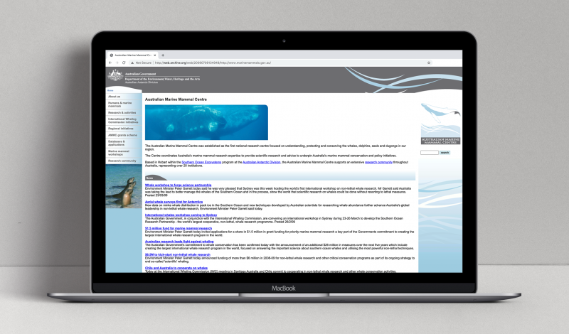Australian Marine Mammal Centre website (original version) displayed on a laptop.